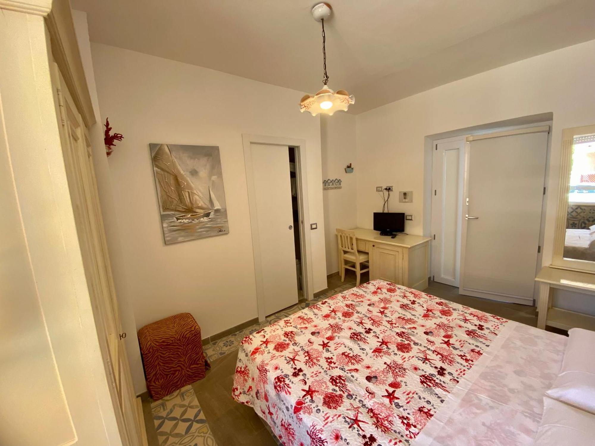 Casetta Al Mare Isola Rossa Habitación foto