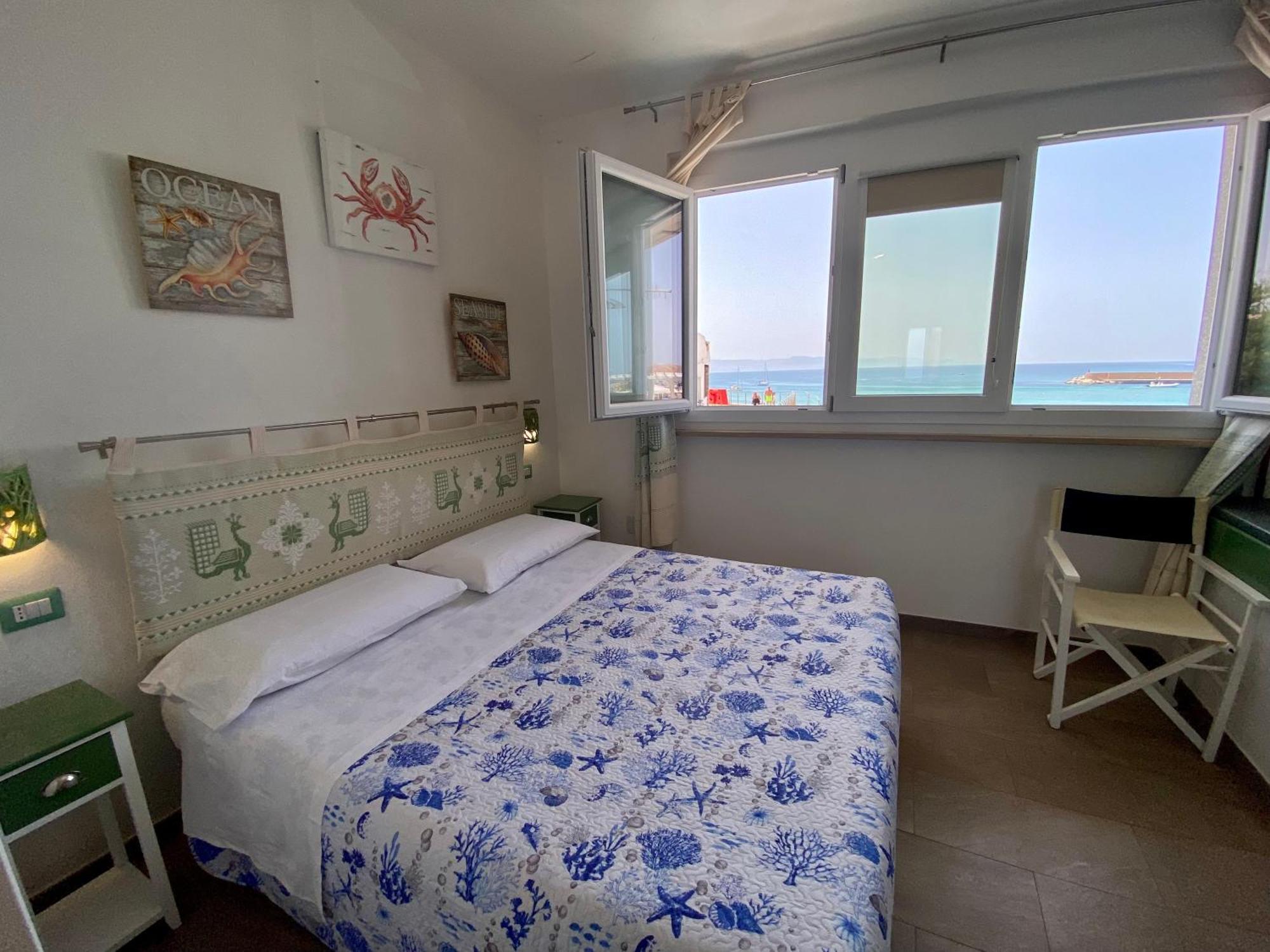 Casetta Al Mare Isola Rossa Habitación foto